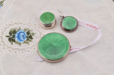 Lot 278 - Three silver circular green guilloche enamelled compacts