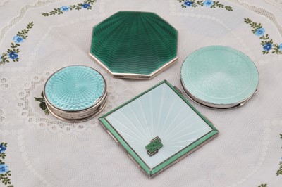 Lot 283 - Four silver green guilloche enamelled compacts