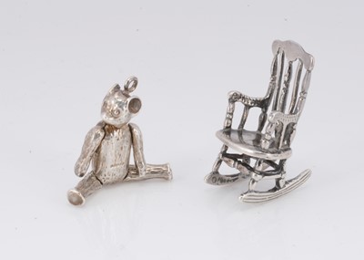 Lot 377 - A miniature modern Teddy Bear pendant and a rocking chair