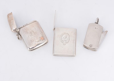 Lot 404 - Three late Victorian and early 20th century silver vesta cases