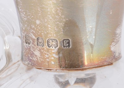 Lot 413 - An Edwardian and later glass and silver mounted Whisky noggin by Hukin & Heath