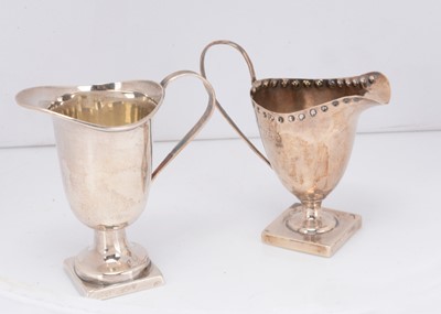 Lot 414 - Two small Georgian style cream jugs