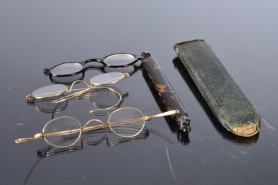 Lot 480 - Two pairs of antique gold coloured spectacles