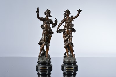 Lot 483 - A pair of Edwardian period bronzed spelter figures after Ruttony