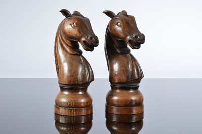 Lot 522 - A pair of second half 20th century carved wooden novelty salt and pepper grinders