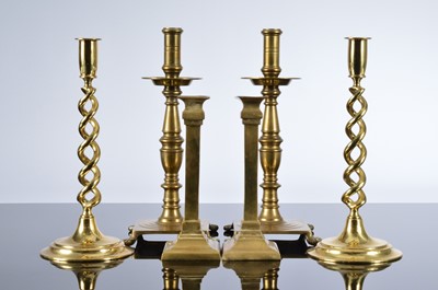 Lot 524 - Three pairs of brass candlesticks