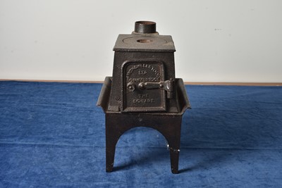 Lot 5 - A small Smith & Wellstood Iron Stove