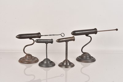 Lot 65 - A group of four Antique Cast Iron Goffering Irons