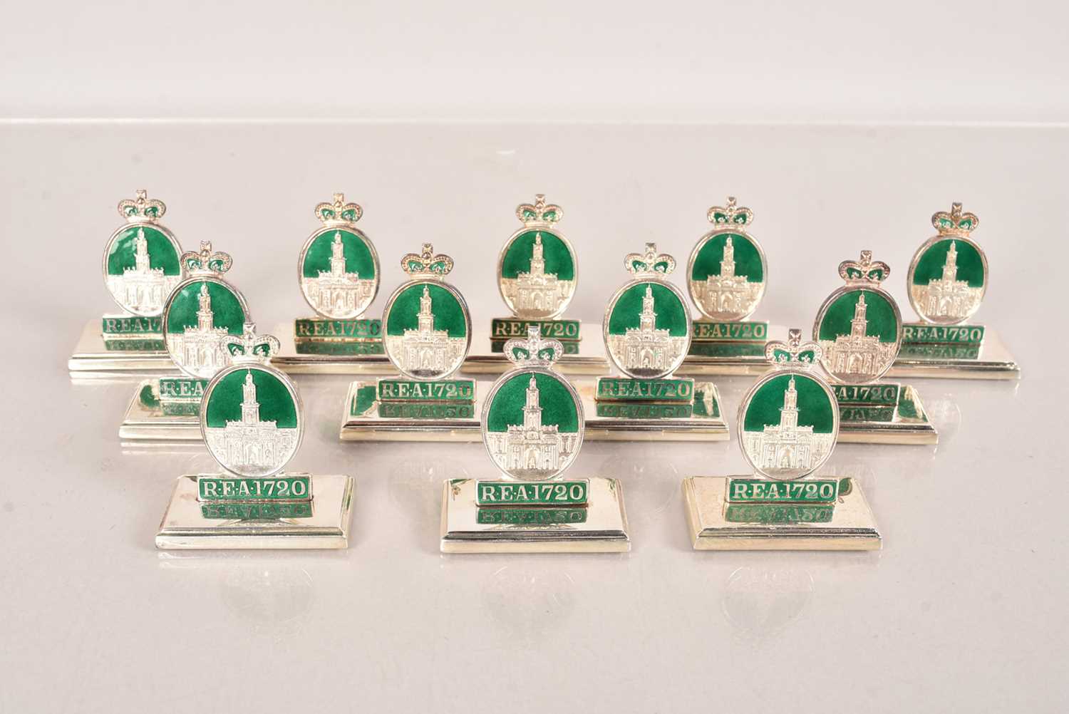 Lot 102 - A set of twelve early 20th Century silver and enamel Menu/Table Place Holders