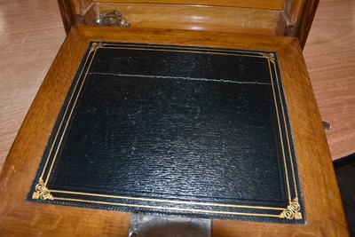 Lot 125 - A mahogany and brass travel desk and tidy