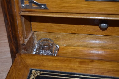 Lot 125 - A mahogany and brass travel desk and tidy