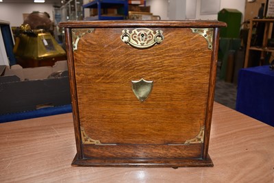 Lot 125 - A mahogany and brass travel desk and tidy