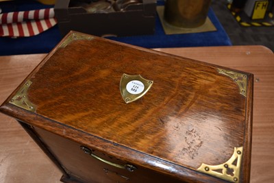 Lot 125 - A mahogany and brass travel desk and tidy