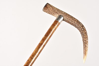 Lot 134 - An antler handled silver collared walking stick by Brigg