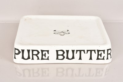 Lot 204 - A Ceramic 'Pure Butter' Stand by Dairy Supply Co Limited