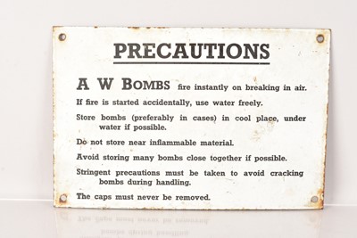 Lot 280 - A 'Precautions A W Bombs enamel side