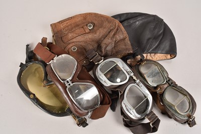 Lot 831 - Two Leather Driving Helmets