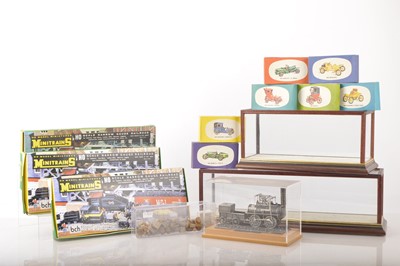 Lot 83 - Three Minitrains HOn30 Narrow Gauge Train Sets, small Display Cases Bachmann Locomotion Display Model and Replicars mini Kit and HO Gauge Platform packaging accessories (qty)