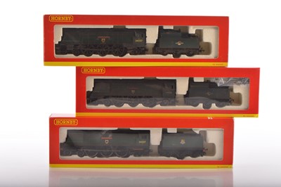 Lot 113 - Three Hornby 00 Gauge boxed BR green unrebuilt West Country Class Locomotives and Tenders all either renamed or weathered (3)