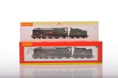 Lot 124 - Pair of Hornby 00 Gauge boxed BR green rebuilt West Country Class Locomotives and Tenders one renamed (2)