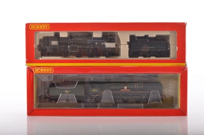 Lot 189 - Pair of Hornby 00 Gauge boxed West Country Class 34013 'Okehampton' one with sound and other heavily weathered (2)