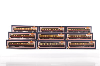 Lot 373 - Bachmann boxed 00 Gauge BR crimson and cream Bullied 63' Corridor Coaches (9)