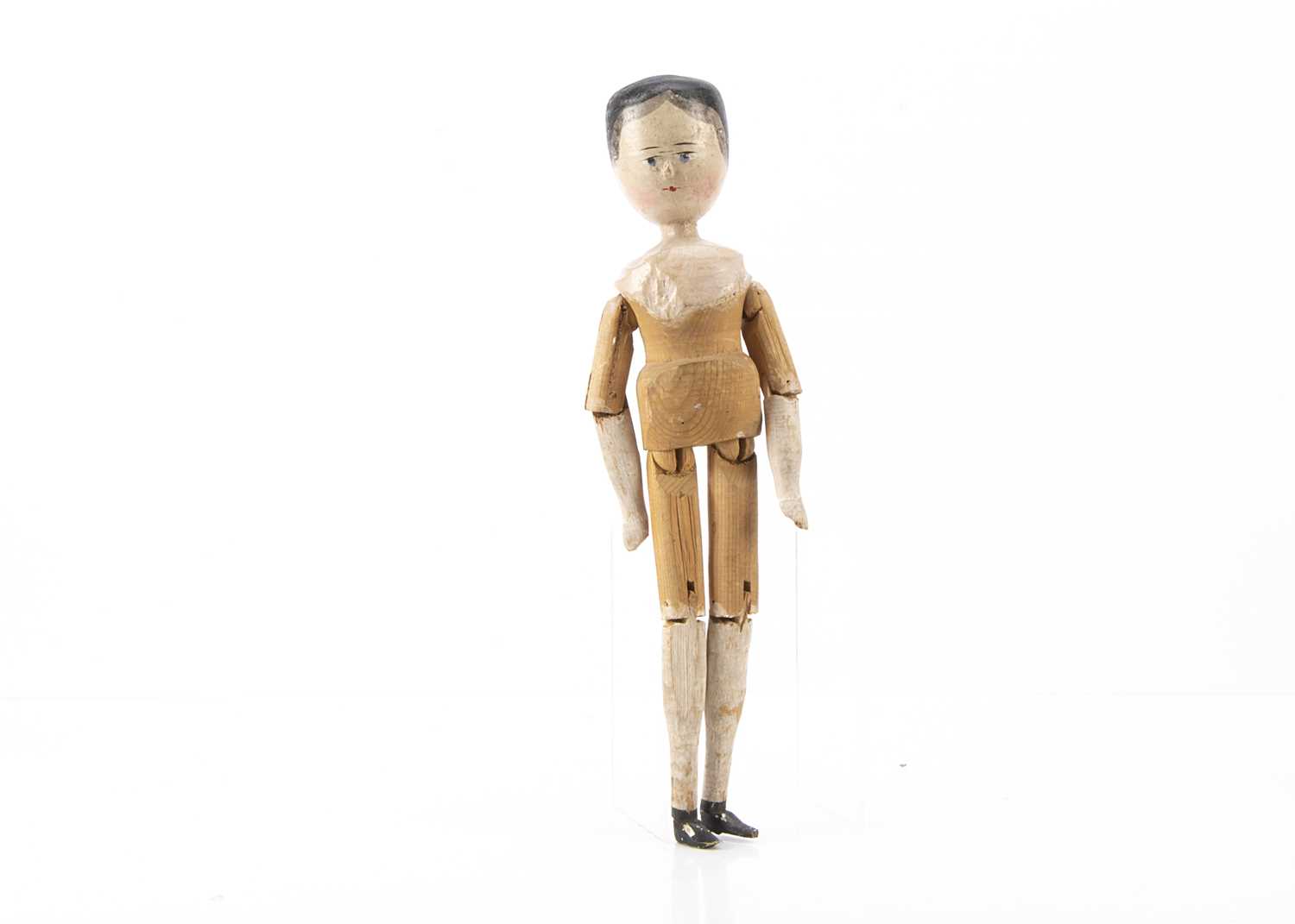 Lot 207 - A German pegged wooden doll circa 1900