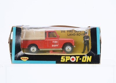 Lot 119 - A Hard To Find Boxed Tri-ang Spot-On No.316 Fire Dept. Land Rover