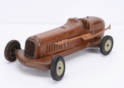 Lot 301 - An unpowered carved wooden Racing Car by unknown maker