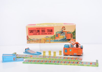 Lot 380 - A Yonezawa Toys (Japan) Tinplate Battery-Operated Shuttling Dog Train