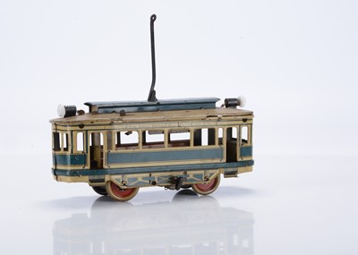 Lot 385 - An uncommon single-deck clockwork floor-running Tramcar by OROBR with electric lights