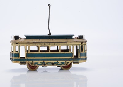 Lot 385 - An uncommon single-deck clockwork floor-running Tramcar by OROBR with electric lights