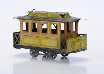 Lot 386 - A tinplate 4-wheel floor-running French Tram by Rossignol