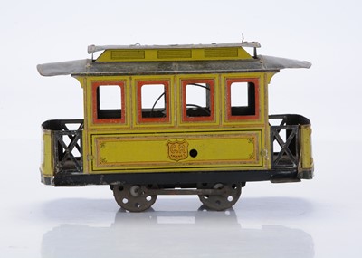 Lot 386 - A tinplate 4-wheel floor-running French Tram by Rossignol