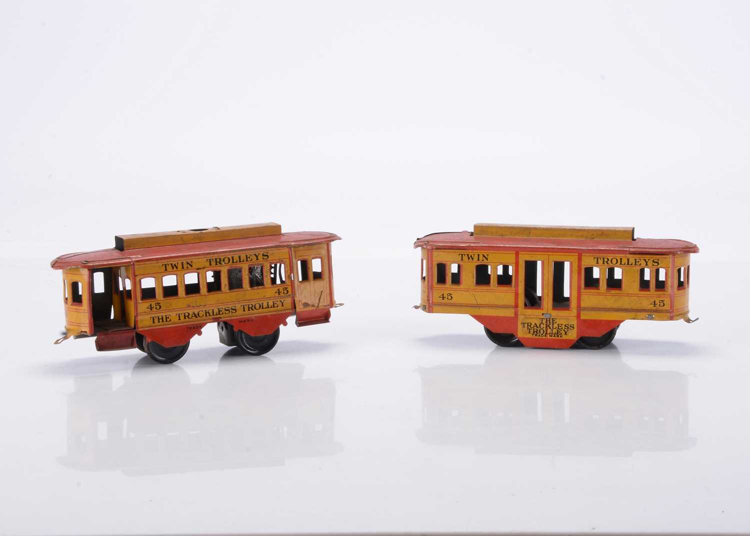 Lot 389 - A pair of tinplate 4-wheel floor-running Trams by Ferdinand Strauss (New York USA)