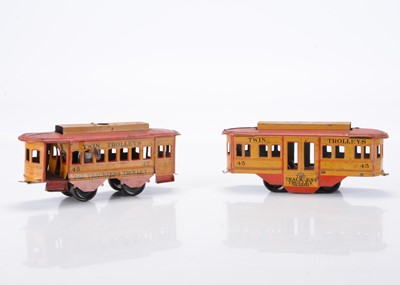 Lot 389 - A pair of tinplate 4-wheel floor-running Trams by Ferdinand Strauss (New York USA)