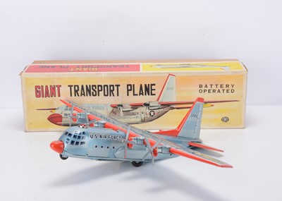 Lot 400 - A Masudaya Modern Toys (Japan) Tinplate Battery-Operated Giant Transport Plane