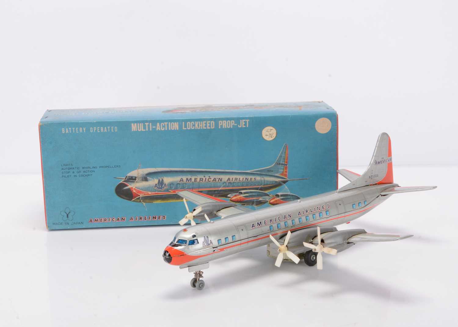 Lot 402 - A Yonezawa (Japan) Tinplate Battery-Operated Multi-Action Lockheed Prop-Jet