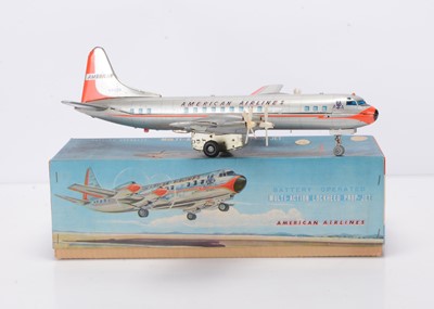 Lot 402 - A Yonezawa (Japan) Tinplate Battery-Operated Multi-Action Lockheed Prop-Jet