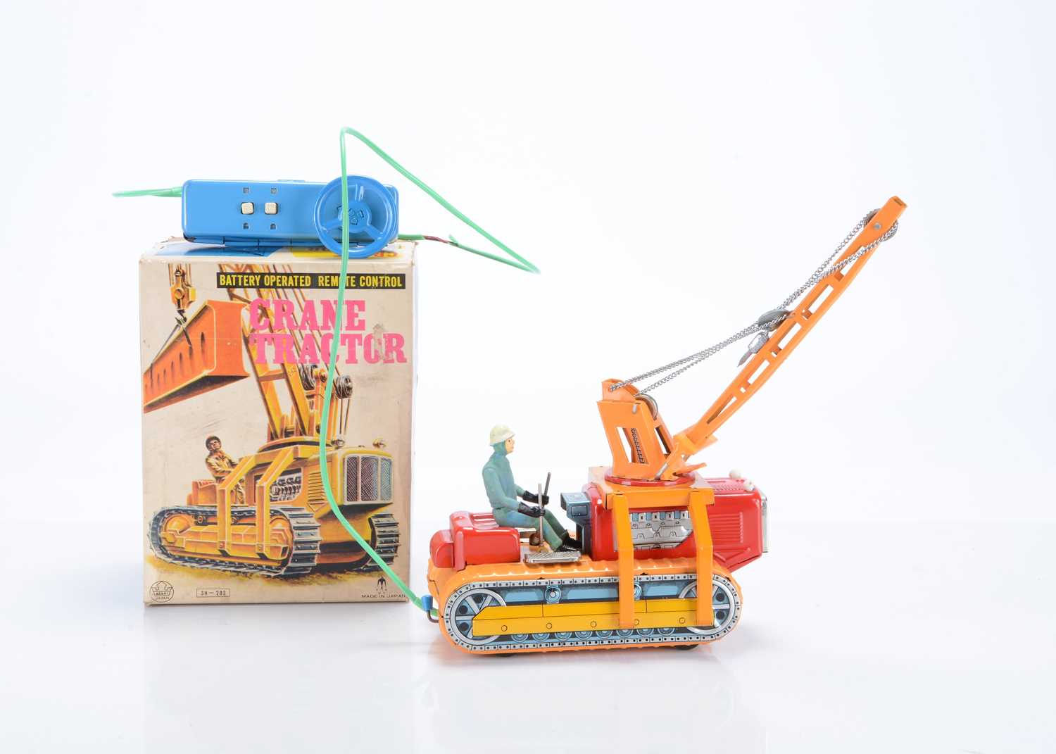 Lot 407 - A Swallow Toys (Japan) Tinplate Battery-Operated Remote Control Crane Tractor