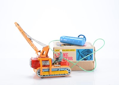 Lot 407 - A Swallow Toys (Japan) Tinplate Battery-Operated Remote Control Crane Tractor