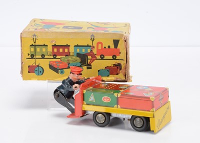Lot 433 - A Günthermann (West Germany) Tinplate Clockwork Railway Porter