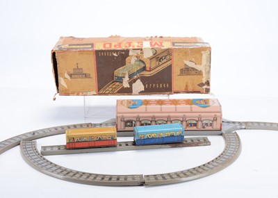 Lot 440 - A Leningrad Metal Works (USSR) Tinplate Clockwork Saint Petersburg Metro Train Toy