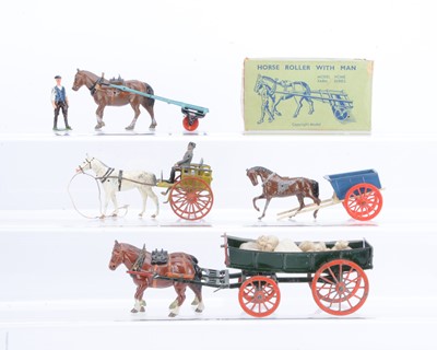 Lot 551 - Britains horse-drawn farm vehicles comprising boxed 9F Horse Roller with Man