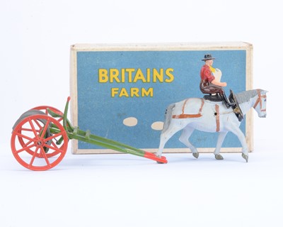 Lot 557 - Britains boxed post WW2 version 8F Horse Rake with driver in very uncommon red shirt