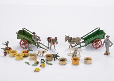 Lot 568 - Taylor & Barrett donkey-drawn carts carrying Aspidistras and vegetables comprising carts (2)