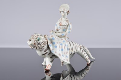 Lot 31 - A second half 20th century terracotta sculpture of a lady and tiger