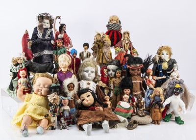 Lot 218 - A large quantity of national costume dolls