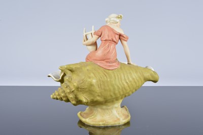 Lot 37 - A Royal Dux porcelain figural group