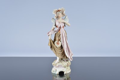 Lot 38 - A Royal Dux porcelain figure of a lady